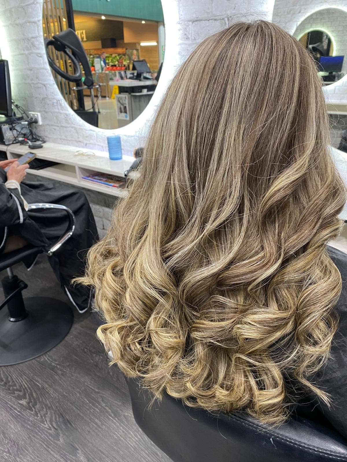 Women's hair after styling at The Diplomat Salon