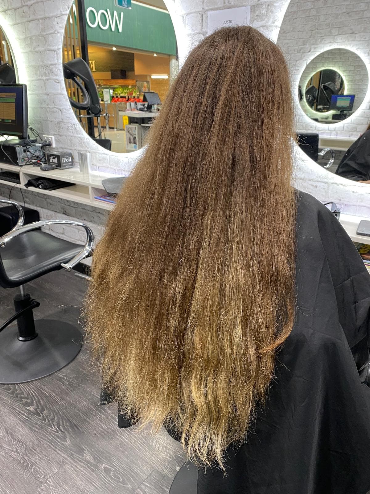 Women's hair before styling at The Diplomat Salon